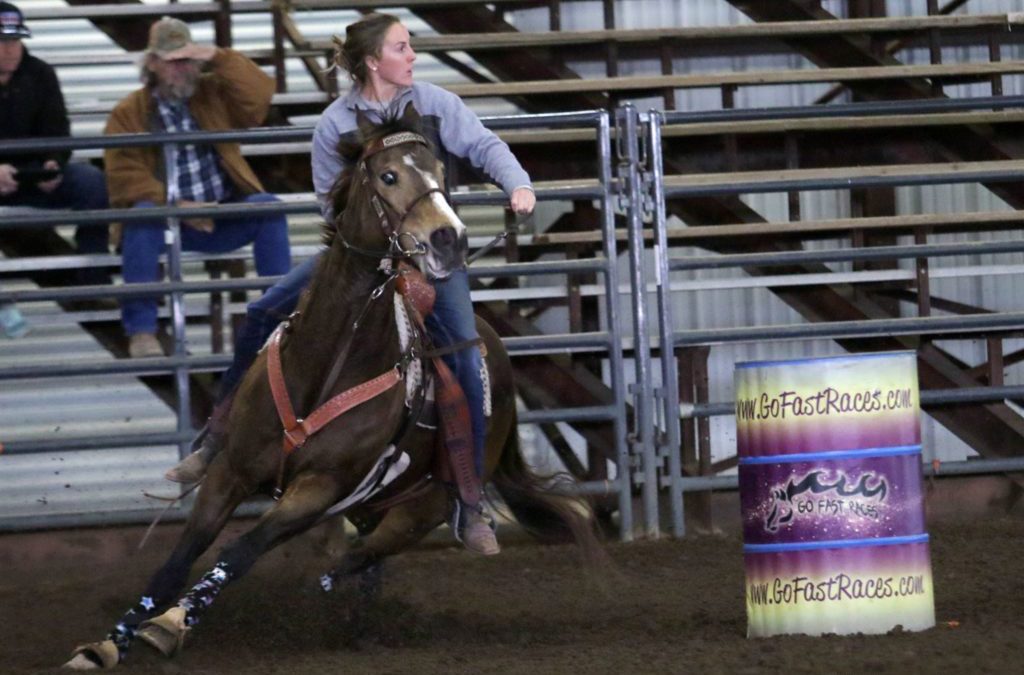 A rider and her horse in the Go Fast barrel race.